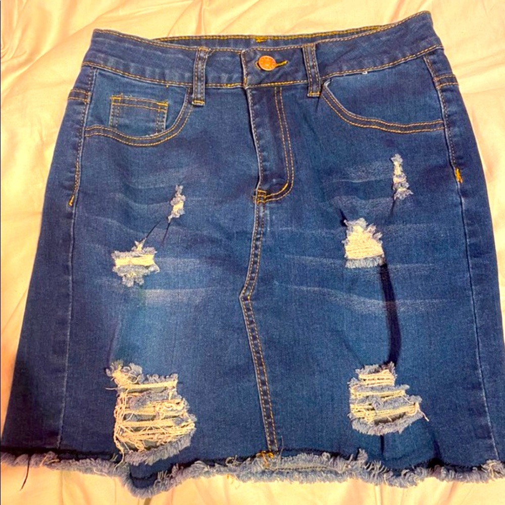 Dark distressed denim skirt